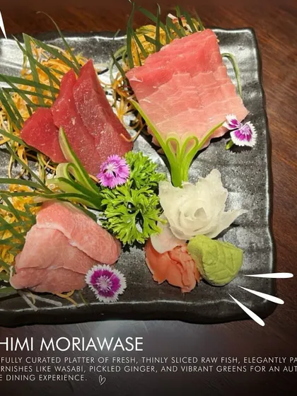 Our Sashimi Moriawase is a beautifully curated platter of fresh, thinly sliced raw fish. Elegantly paired with garnishes like wasabi and pickled ginger, it offers an authentic and refined Japanese dining experience.