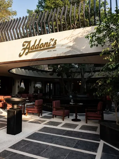 The entrance to Addoni's in South Delhi, where our furniture sets the tone for an elegant dining experience from the moment guests arrive. We believe the ambiance is just as important as the menu.