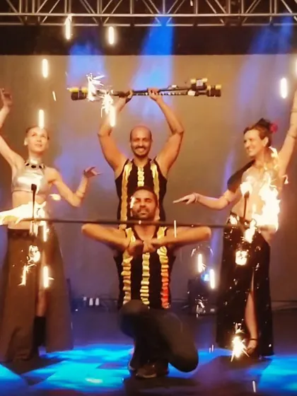 My fire crew posing after a show in Bangalore. We design and build custom pyrotechnic props like these, ensuring every performance at a wedding or private party is completely unique and visually spectacular.
