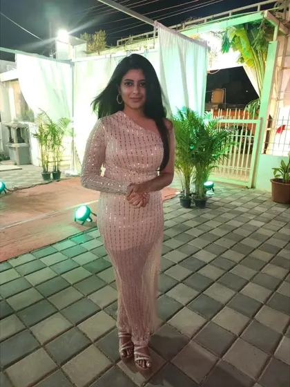 A modern, blingy gown that is perfect for glamorous reception nights or corporate award shows.