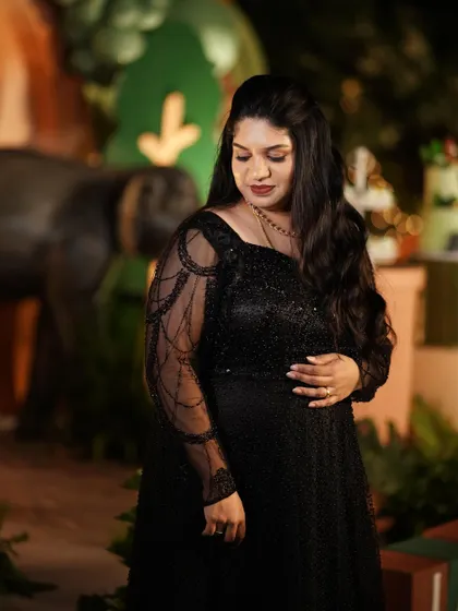 A close-up of Supritha in her custom black gown, looking absolutely glamorous.