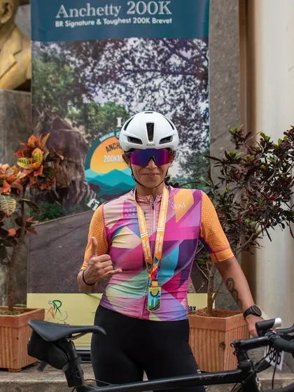 Posing with my bike after the Anchetty 200K. This is a snapshot of my journey from amateur runner to competitive triathlete and coach.