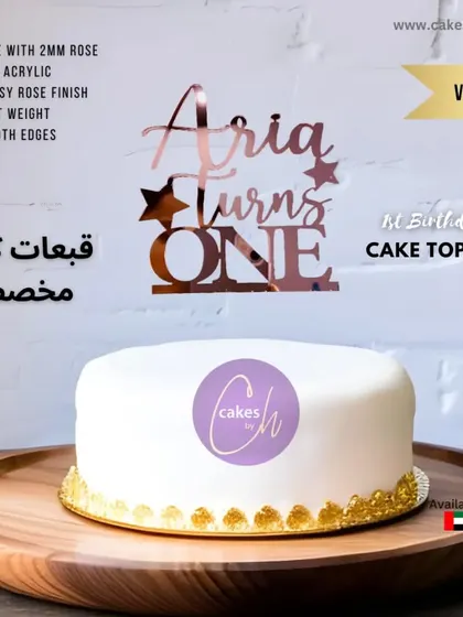 Celebrating Aria's first birthday with a lovely rose gold acrylic topper. The combination of script and block fonts adds a dynamic and modern feel to the design.