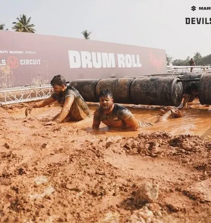 Getting through the 'Drum Roll' obstacle is about grit. Crawling through mud under barrels tests your determination when you're already exhausted. We train to be strong even when things get messy.