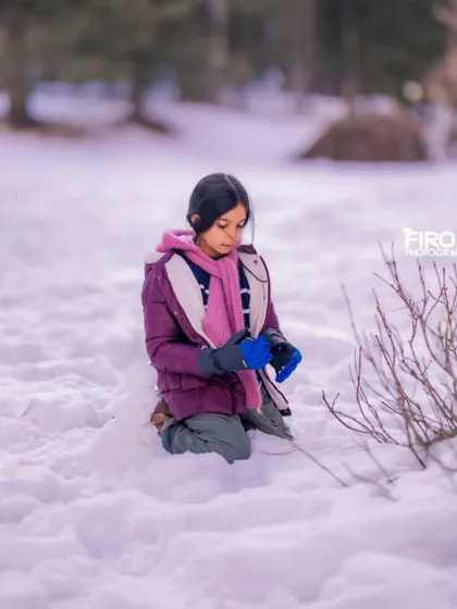 Lost in her own little world. Capturing these unscripted moments of my daughter playing in the snow is what being a photographer is all about for me.