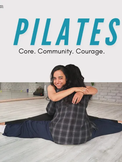 Pilates at Flux is about Core, Community, and Courage. We believe in building strength together, as shown in this supportive partner stretch.