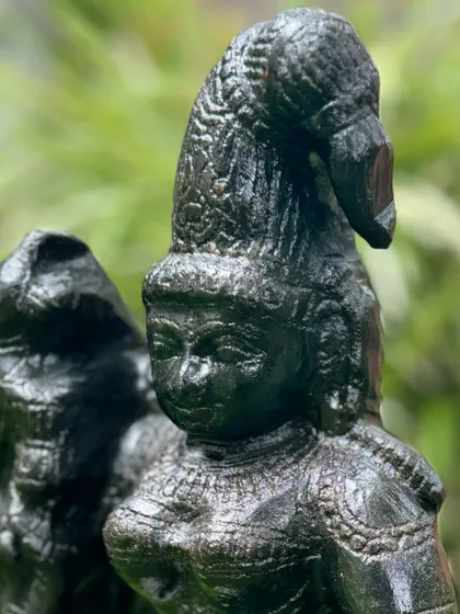 This is Madurai Meenakshi, the "fish-eyed one," hand-carved from black granite by talented artists from Tamil Nadu.
