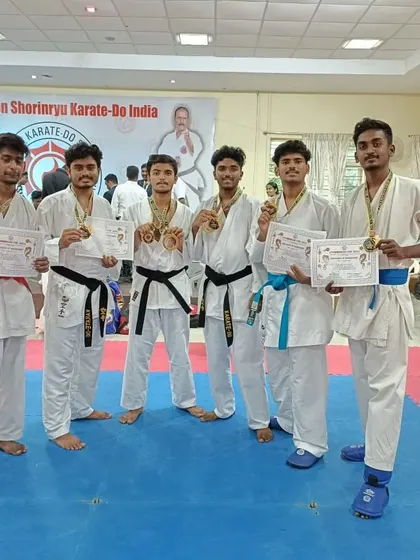 Our team proudly displays their gold and silver medals after a successful national level championship. We believe in celebrating the hard work that leads to these achievements.