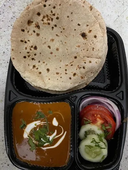 This is my classic home-style tiffin, featuring soft rotis made from fresh chakki atta, served with a comforting dal, and a side of fresh salad. It's the perfect simple and satisfying vegetarian lunch or dinner.