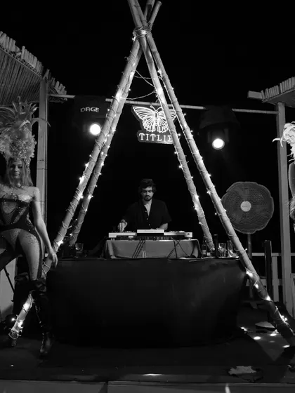 The unique setup at Titlie, Goa, flanked by costumed performers. I love playing at venues with a distinct theme and atmosphere.