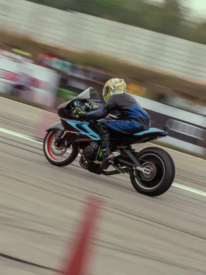A custom drag bike with a distinctive blue and black livery. These purpose-built machines are engineered for one thing only: maximum acceleration.