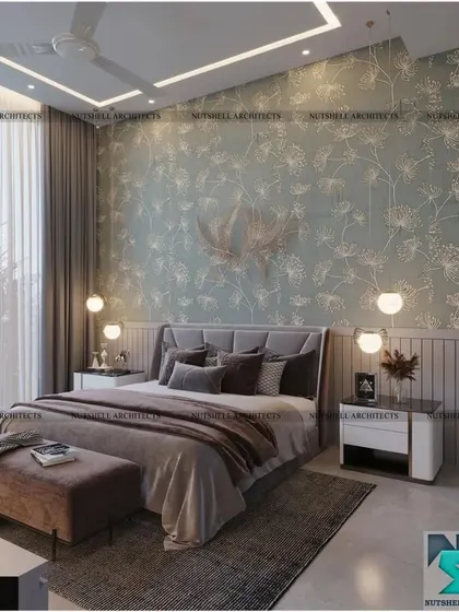 In this bedroom, a beautiful floral wallpaper creates a soft and romantic feature wall. The design is complemented by simple, modern furniture and warm pendant lighting for a cozy and inviting feel.