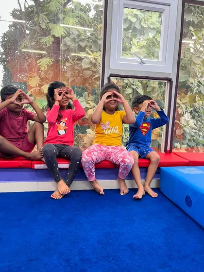 Making 'owl eyes' is a fun way to practice focus and observation. Our classes are filled with imaginative games that help children develop cognitive skills while they play.