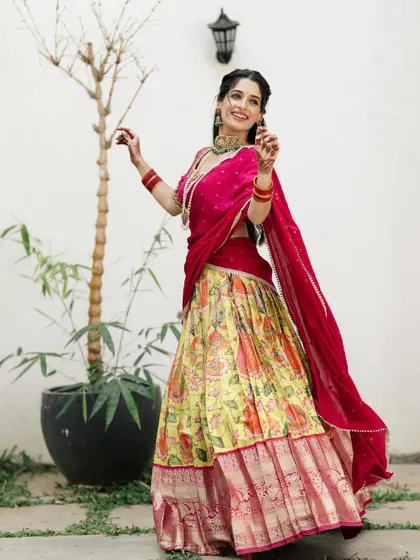 A playful and joyous shot. The movement of the lehenga shows off the entire look, and the jewellery adds the perfect finishing touch.