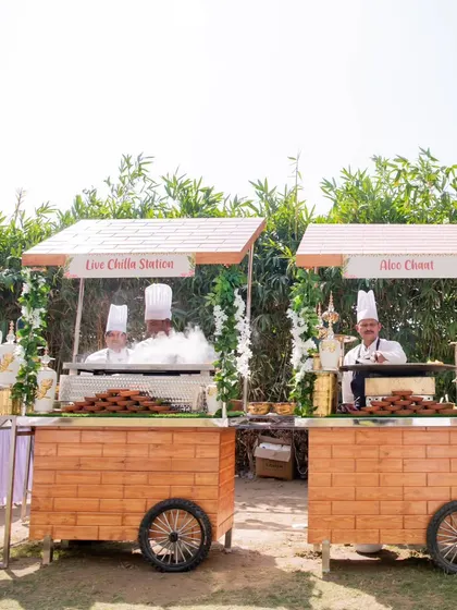 A wide view of two live food stations, one for Chilla and one for Aloo Chaat. This shows how I can set up multiple interactive counters to offer a variety of fresh options.