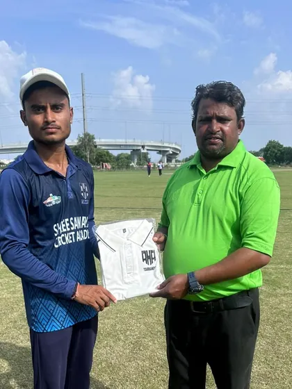 Celebrating our players' success is a core part of our academy. Here I am presenting the Man of the Match award to Karan Mishra after a great performance.