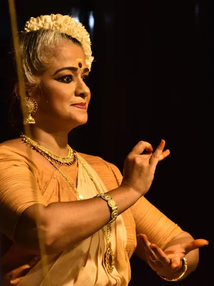 A moment of devotion during a 'sevakkalam' or sacred offering at the Sreeramaswami temple. We craft performances specifically for temple spaces, honoring the spiritual roots of classical dance.