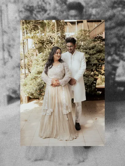 A full-length portrait of the engaged couple, framed with a grainy, vintage effect for an artistic touch.