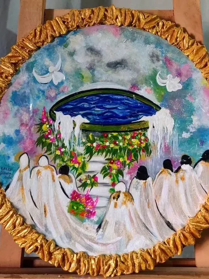 A unique circular painting with a celestial, dreamy feel. This piece features soft colors, floral elements, and a textured gold border, making it a beautiful statement artwork.