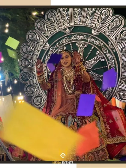 A bride making a grand entrance on one of my custom props, surrounded by paper blasters. I help create these high-energy moments that are full of joy and celebration.