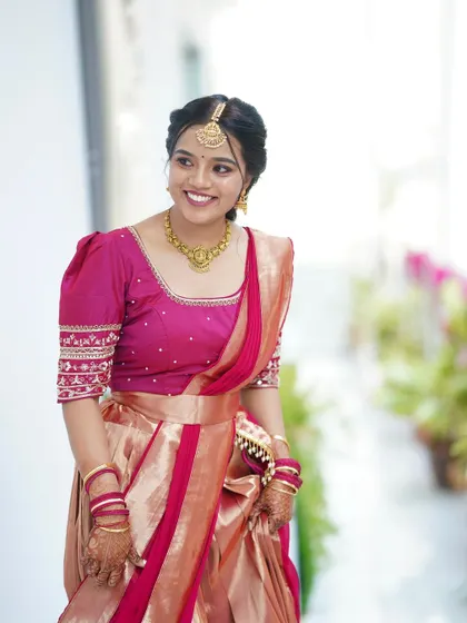 A happy, candid moment. I love creating looks that allow my clients' personalities to shine through, ensuring they feel comfortable and beautiful on their special day.