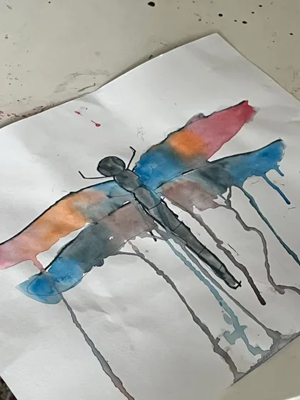 A close-up of the beautiful dripping watercolor effect on this dragonfly. We love experimenting with how paint and water interact to create unexpected and beautiful results.