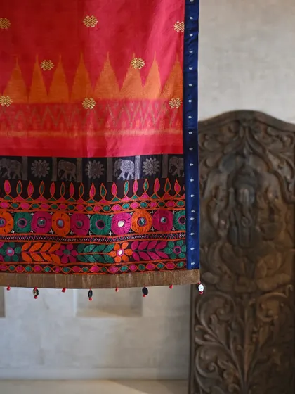 A close-up of the runner, showing the details of the Balinese weft Ikat pattern and the colorful, mirror-studded Banjara panel. This piece is a story of my travels and textile discoveries.