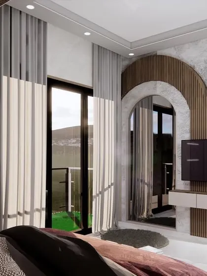 A master bedroom design featuring elegant arches and a mix of textures. The room includes a walk-in closet and a balcony, creating a spacious and luxurious suite.