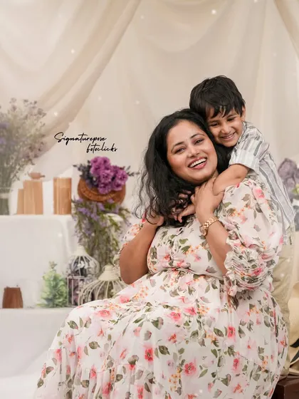 A candid moment of laughter and love between a mother and her son. Our sessions are designed to be relaxed and fun, allowing for genuine interactions to shine through.