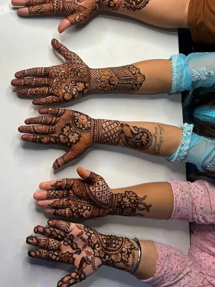 A lineup of beautiful guest mehandi designs. We offer a variety of patterns so guests can choose something that fits their style, from simple to more detailed.