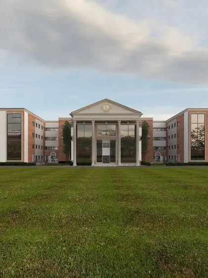 This is a look at a school facade we designed, blending classical architectural principles with modern construction. The grand columns and symmetrical design create a sense of permanence and academic prestige, showing our capability on large-scale institutional projects.