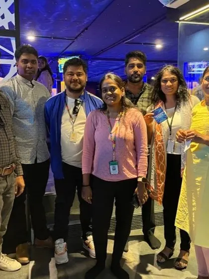 A team from a corporate event poses together, showing the fun and relaxed atmosphere we create for company gatherings.