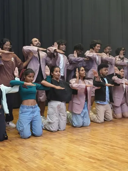 The energy behind the scenes is just as electric. Here are our dancers during a run-through, making last-minute tweaks before hitting the stage for Performance Night.