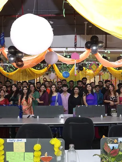 The whole team gathered for a group photo. I ensure the decor provides a beautiful backdrop for capturing memories of the event.