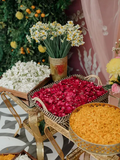 A refreshing twist on a classic Haldi. We used baskets of fresh clementines, daffodils, and rose petals, adding a unique color palette and symbolism of new beginnings to the celebration.