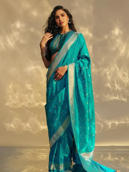 A look from a campaign I styled, showcasing modern ways to wear traditional Benarasi weaves. This stunning turquoise Benarasi saree is paired with a contemporary blouse for a fresh, elegant look.