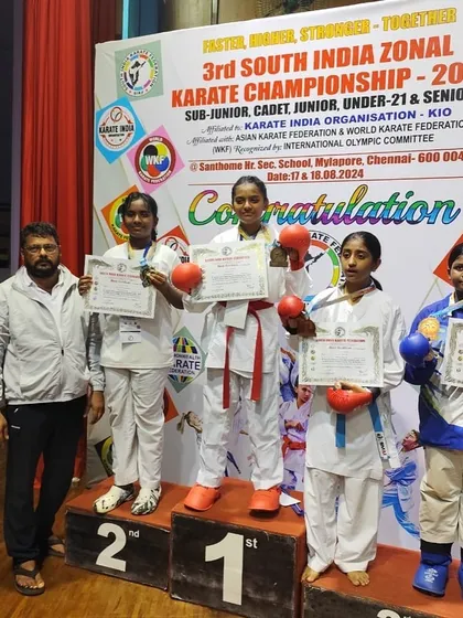 A different angle of the victory ceremony. Shikha's achievement is a testament to her relentless training and the competitive spirit of our team.