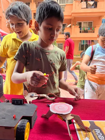 Absolutely splendid! These pictures capture the fun and discovery at one of our event stalls. Kids of all ages get to stop by, tinker with our kits, and get a taste of what it's like to be a maker.