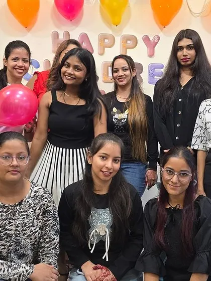 Another group of smiling students, celebrating together at the academy. We are a family.