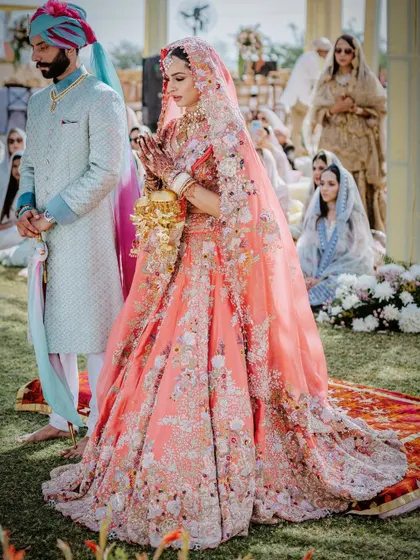 The bride's stunning pastel lehenga by Anamika Khanna, a perfect choice for a dreamy day-time Anand Karaj.