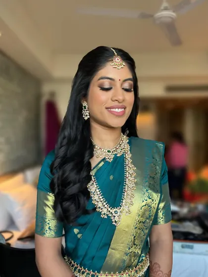 Another shot of the beautiful eye makeup. The soft shimmer and clean liner enhance her eyes without being too heavy, perfect for a traditional ceremony.