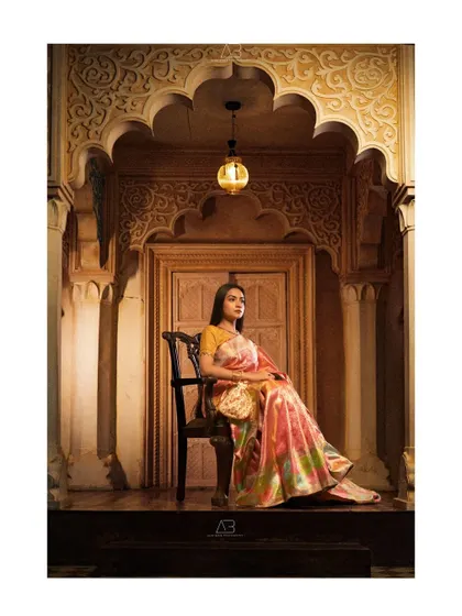We transformed this space into a royal court for a day. This shot shows how I use light and architecture to create an iconic, painterly portrait that feels both timeless and powerful. It’s about making you the masterpiece.