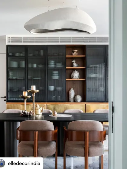 A full view of the dining area, featured in Elle Decor. The space is designed for a tri-generational family, with a focus on harmony, functionality, and quiet luxury.