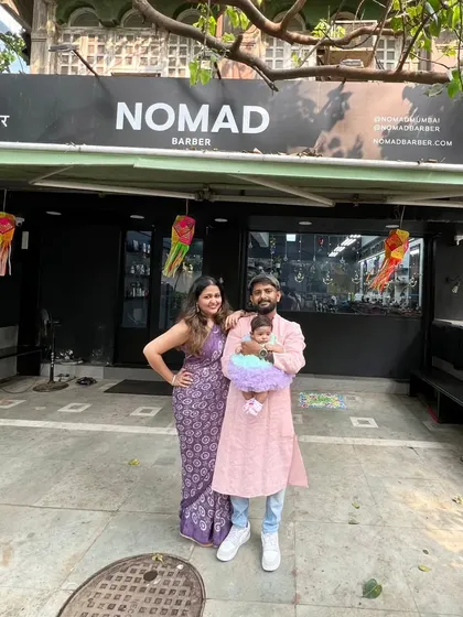 Celebrating Diwali with my family outside the shop. My wife has been my biggest supporter on this journey, and I'm so grateful for everything.