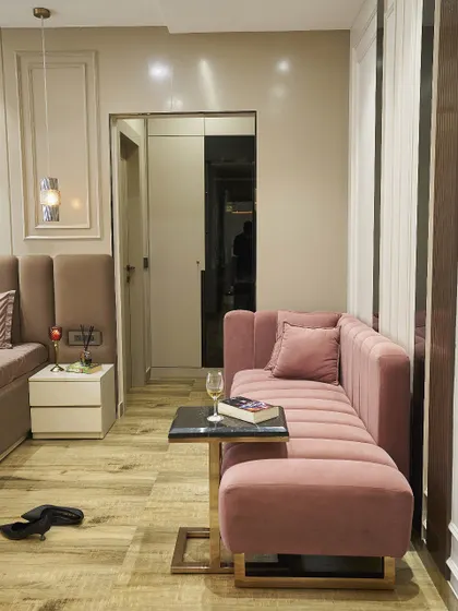 Another view of the cozy daybed, showing how it fits perfectly into the corner of the room, creating a functional and stylish nook.