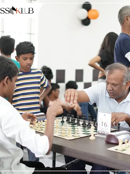 An intergenerational match in progress at our Coimbatore center opening. Our tournaments welcome players from all walks of life to compete and connect.