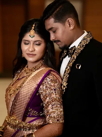 A romantic close-up of the couple. The groom's lapel embroidery perfectly complements the zardozi work on Deepika's blouse.