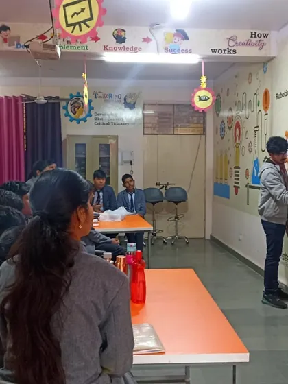 A student presents his ideas on a whiteboard in our Atal Tinkering Lab (ATL), a space designed to foster creativity, design thinking, and innovation.