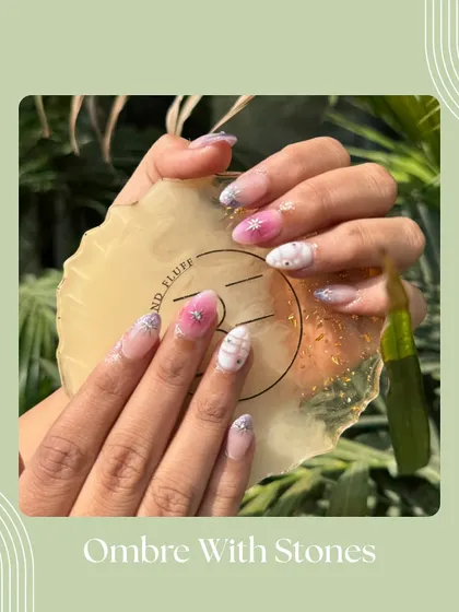 This design takes the ombré look to the next level by adding a cascade of stones at the cuticle. It's a glamorous and eye-catching style.
