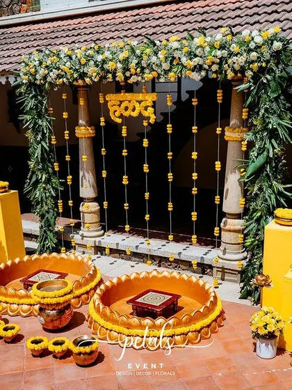 A Haldi ceremony should be full of joy and vibrant color. I designed this traditional courtyard setup at Angana with bold yellow accents, intricate marigold arrangements, and classic brass props to create a space that is both visually stunning and perfect for sacred rituals.